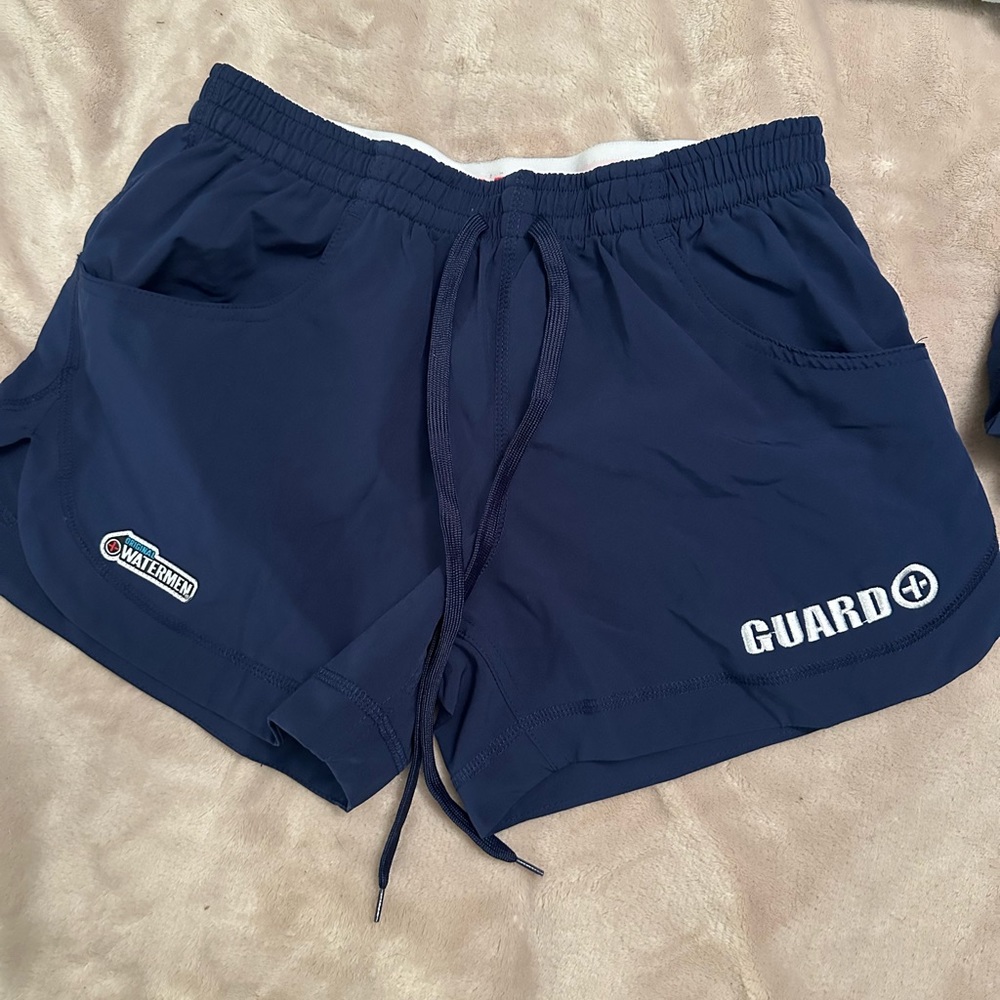 Women’s Watermen navy blue drawstring guard shorts size small